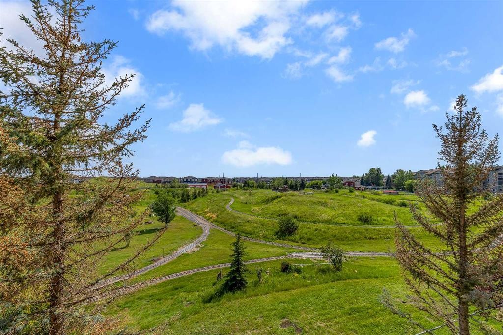 6307-304 Mackenzie Way Sw, Airdrie, AB - Outdoor With View