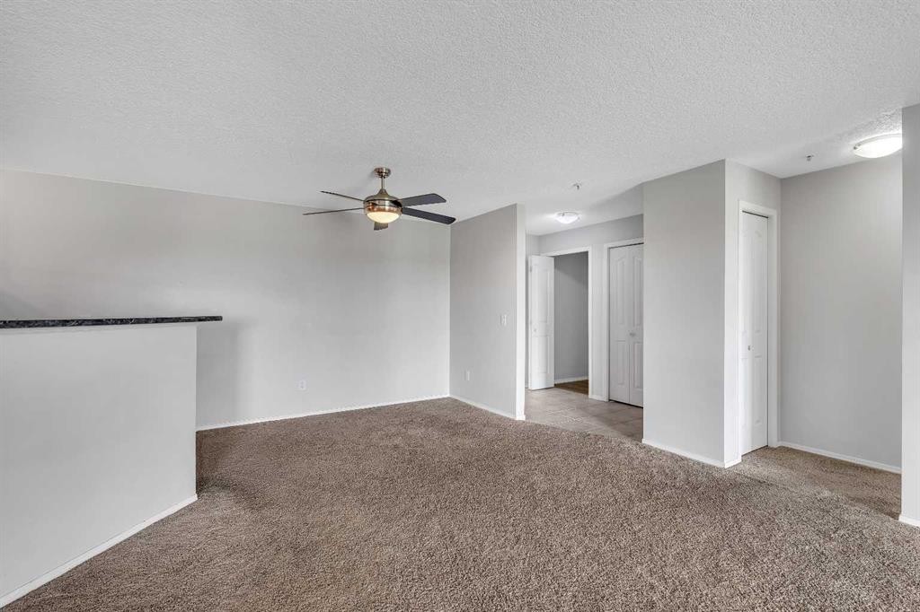 6307-304 Mackenzie Way Sw, Airdrie, AB - Indoor Photo Showing Other Room