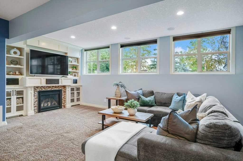 127 Hillcrest Boulevard, Strathmore, AB - Indoor Photo Showing Living Room With Fireplace