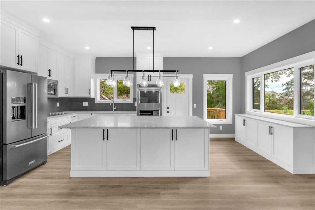 2016 30 Avenue, Nanton, AB - Indoor Photo Showing Kitchen With Upgraded Kitchen