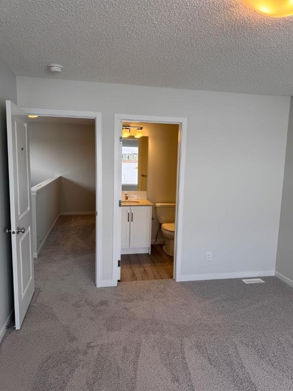 25 Setonvista Gate Se, Calgary, AB - Indoor Photo Showing Other Room