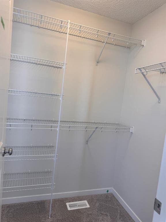 25 Setonvista Gate Se, Calgary, AB - Indoor With Storage