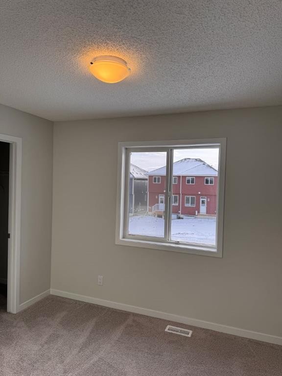 25 Setonvista Gate Se, Calgary, AB - Indoor Photo Showing Other Room