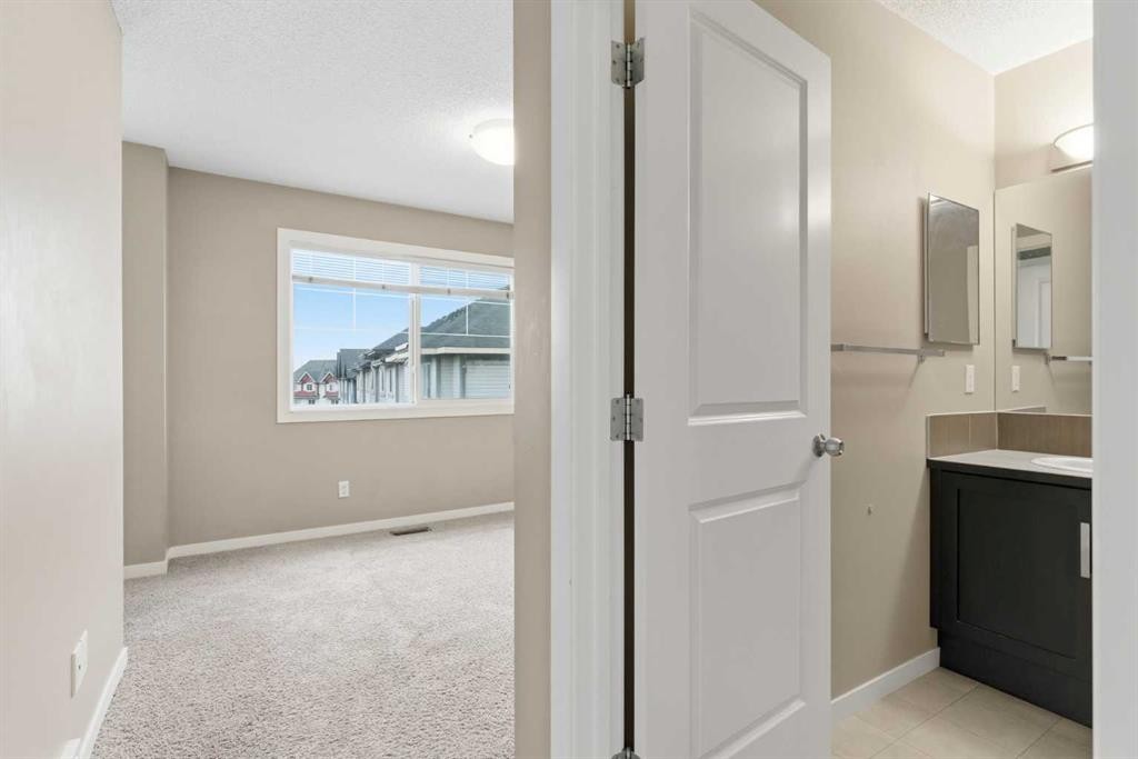 172 New Brighton Point Se, Calgary, AB - Indoor Photo Showing Other Room