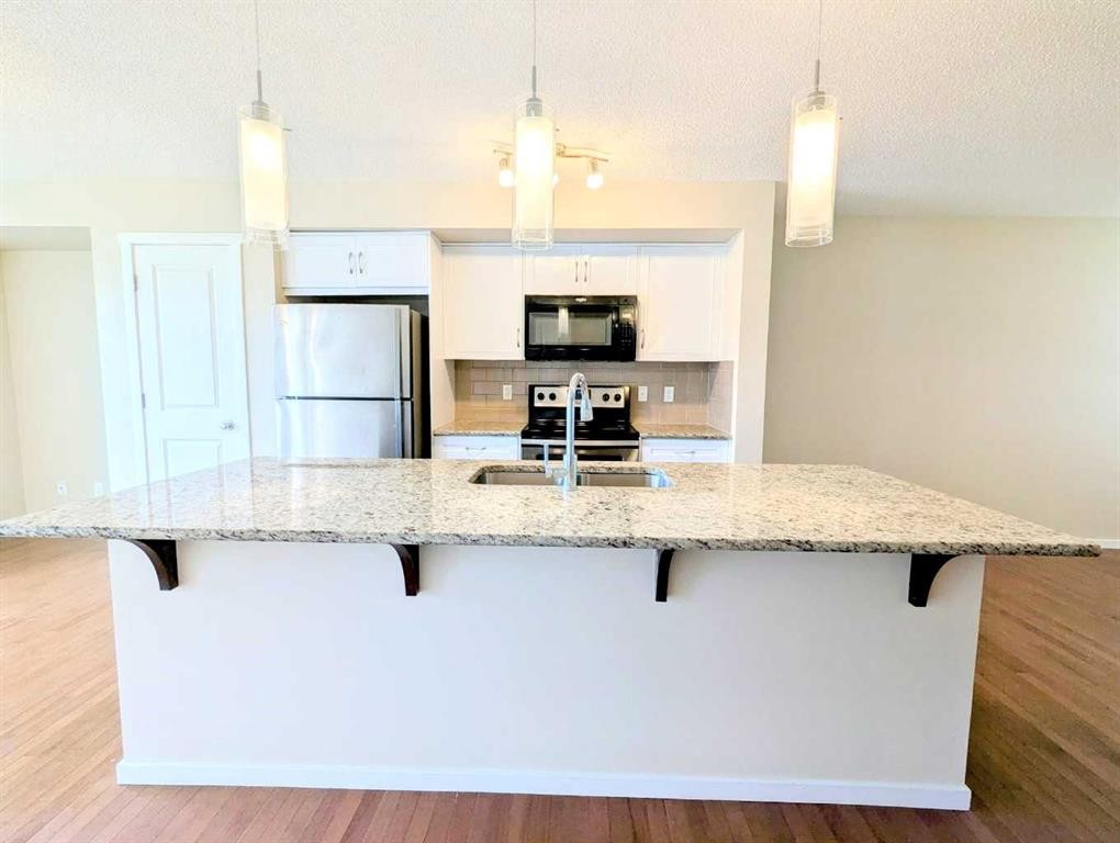 187 Evansborough Way Nw, Calgary, AB - Indoor Photo Showing Kitchen With Stainless Steel Kitchen With Upgraded Kitchen