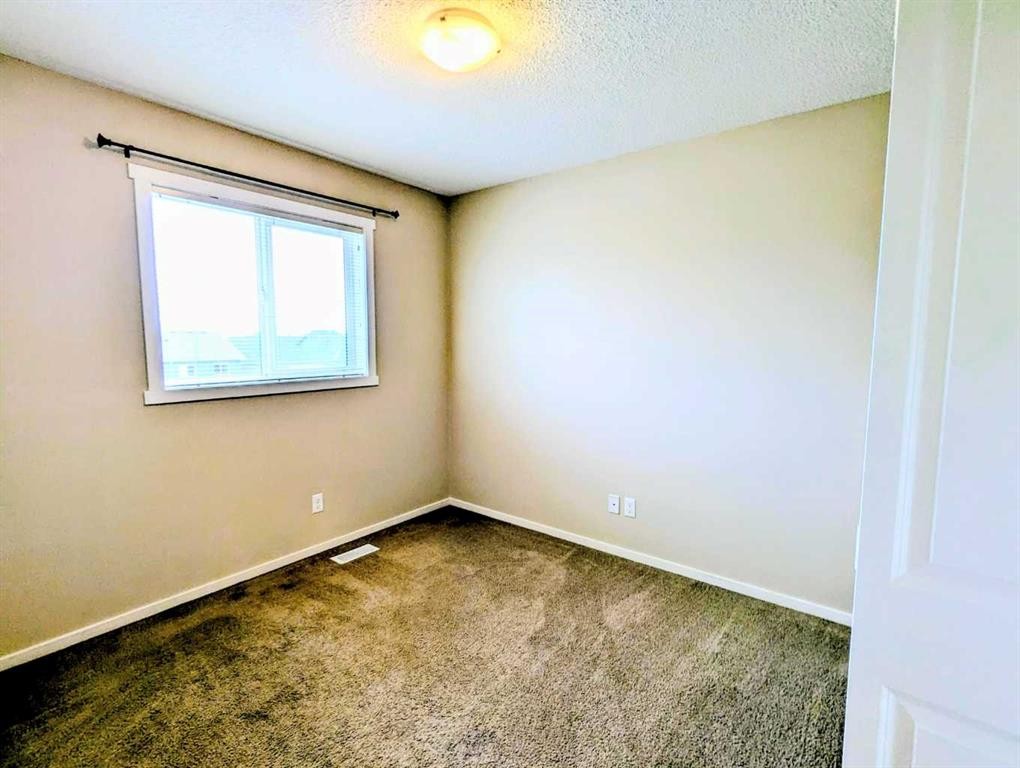 187 Evansborough Way Nw, Calgary, AB - Indoor Photo Showing Other Room