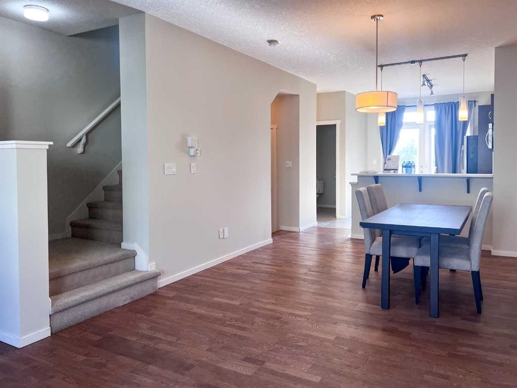 28 Kinlea Common Nw, Calgary, AB - Indoor Photo Showing Dining Room