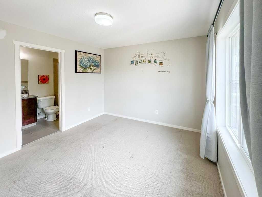 28 Kinlea Common Nw, Calgary, AB - Indoor Photo Showing Other Room