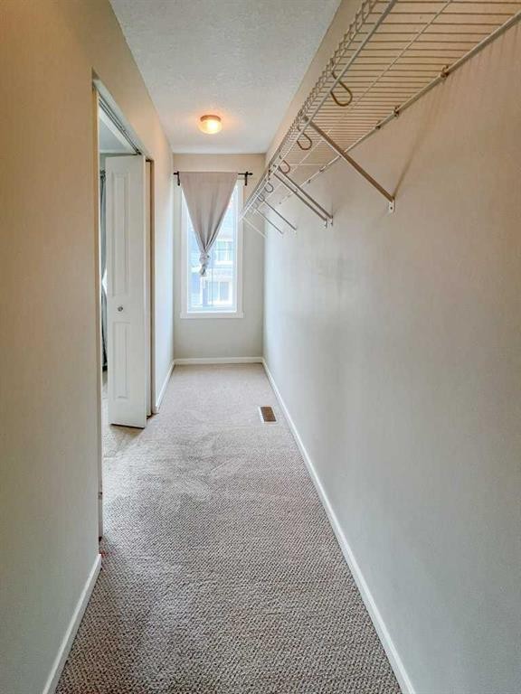 28 Kinlea Common Nw, Calgary, AB - Indoor Photo Showing Other Room