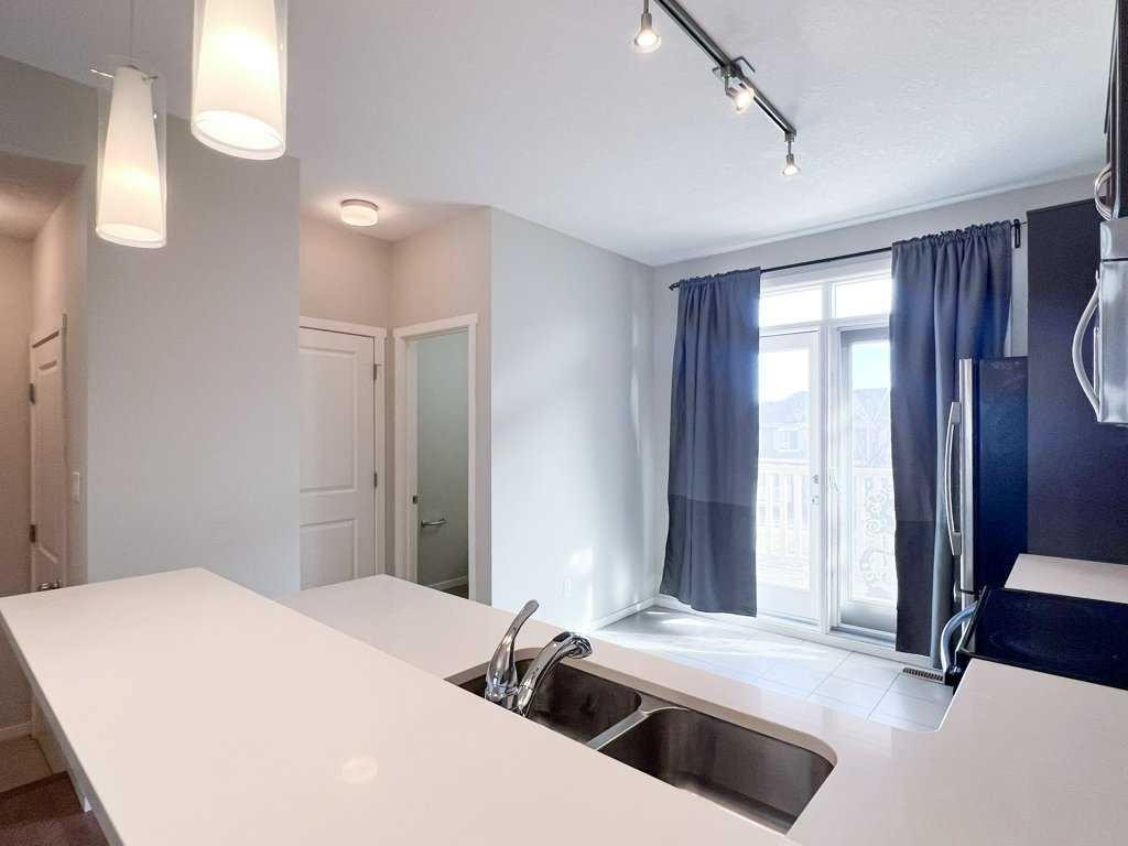 28 Kinlea Common Nw, Calgary, AB - Indoor Photo Showing Kitchen With Double Sink