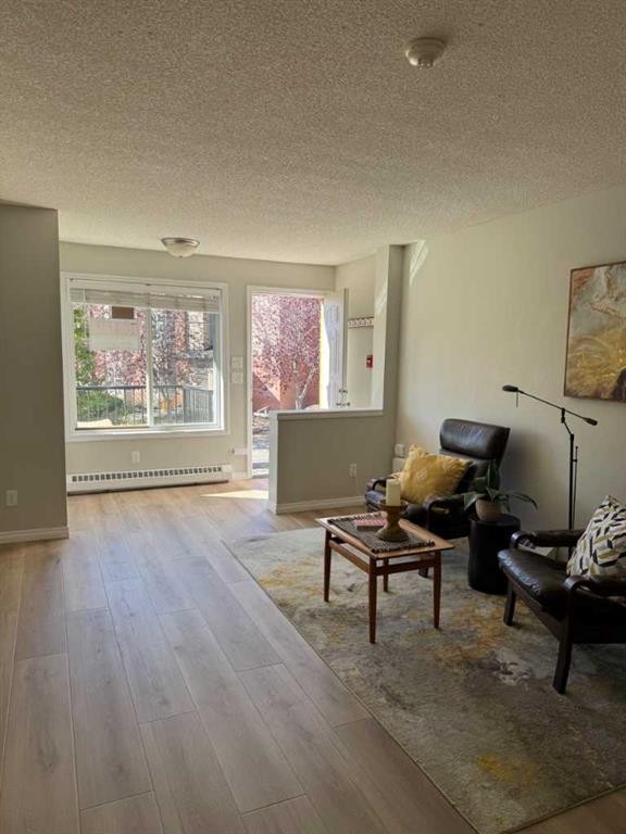 214 Mckenzie Towne Lane Se, Calgary, AB - Indoor Photo Showing Living Room