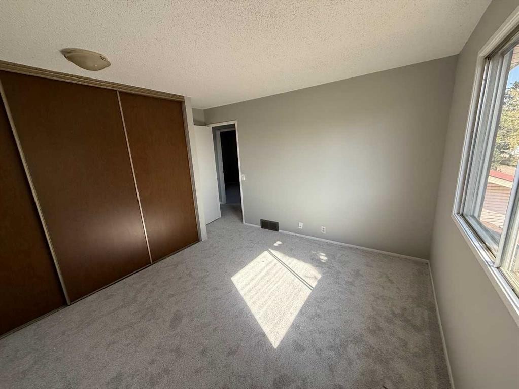 74 Aberdare Way Ne, Calgary, AB - Indoor Photo Showing Other Room