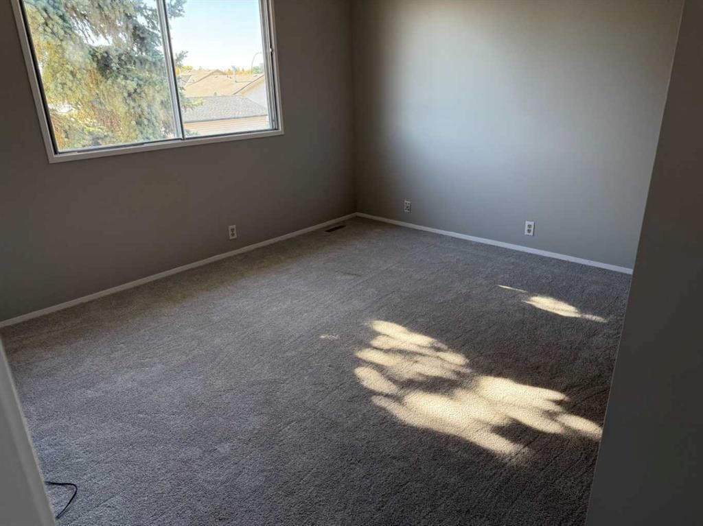74 Aberdare Way Ne, Calgary, AB - Indoor Photo Showing Other Room