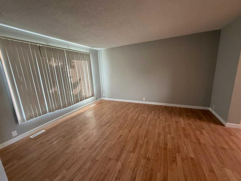 74 Aberdare Way Ne, Calgary, AB - Indoor Photo Showing Other Room