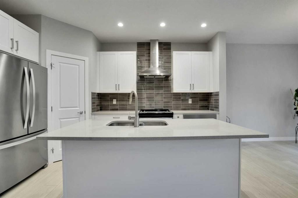 232 Cornerbrook Common Ne, Calgary, AB - Indoor Photo Showing Kitchen With Double Sink With Upgraded Kitchen