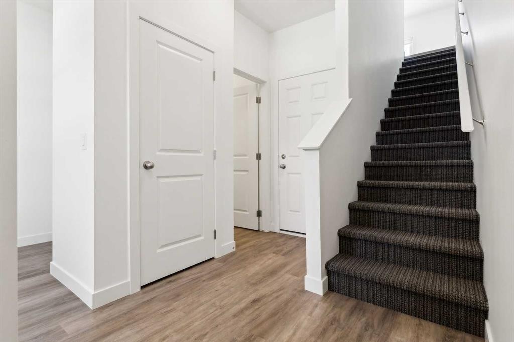 703-24 Rivercrest Drive, Cochrane, AB - Indoor Photo Showing Other Room