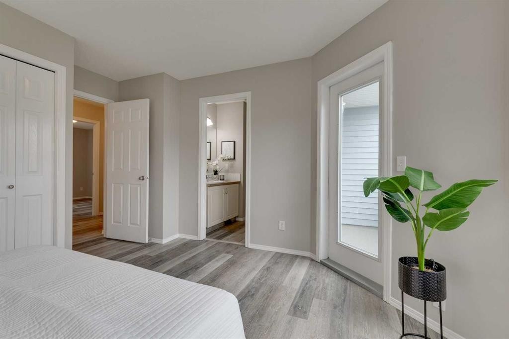 910 Prairie Sound Circle Nw, High River, AB - Indoor Photo Showing Bedroom