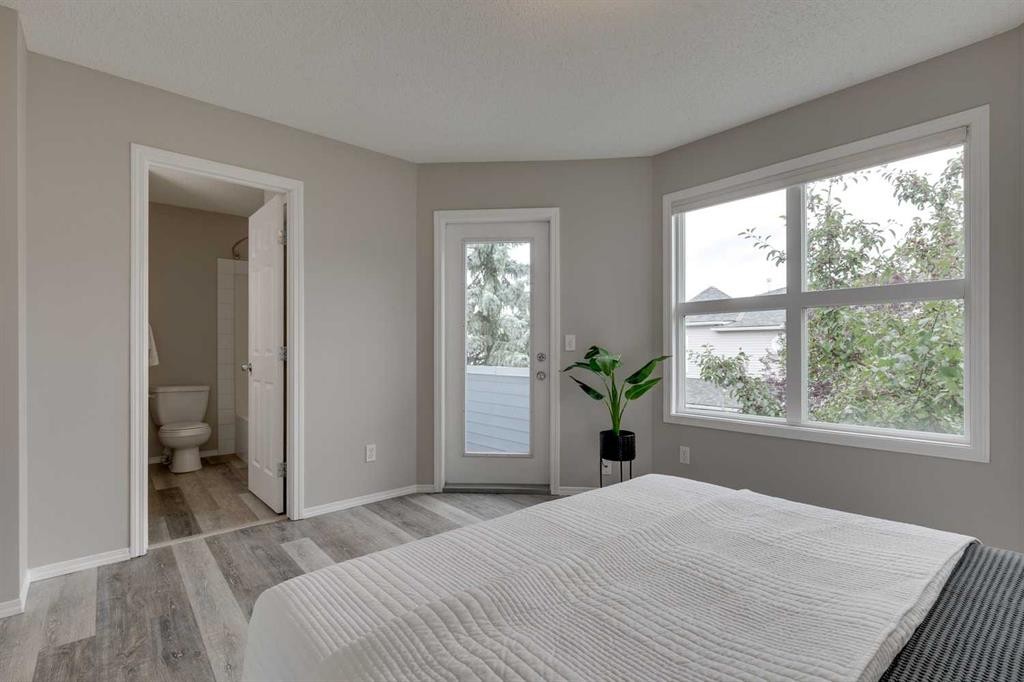 910 Prairie Sound Circle Nw, High River, AB - Indoor Photo Showing Bedroom