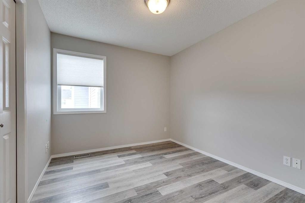 910 Prairie Sound Circle Nw, High River, AB - Indoor Photo Showing Other Room