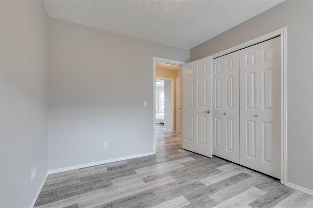 910 Prairie Sound Circle Nw, High River, AB - Indoor Photo Showing Other Room