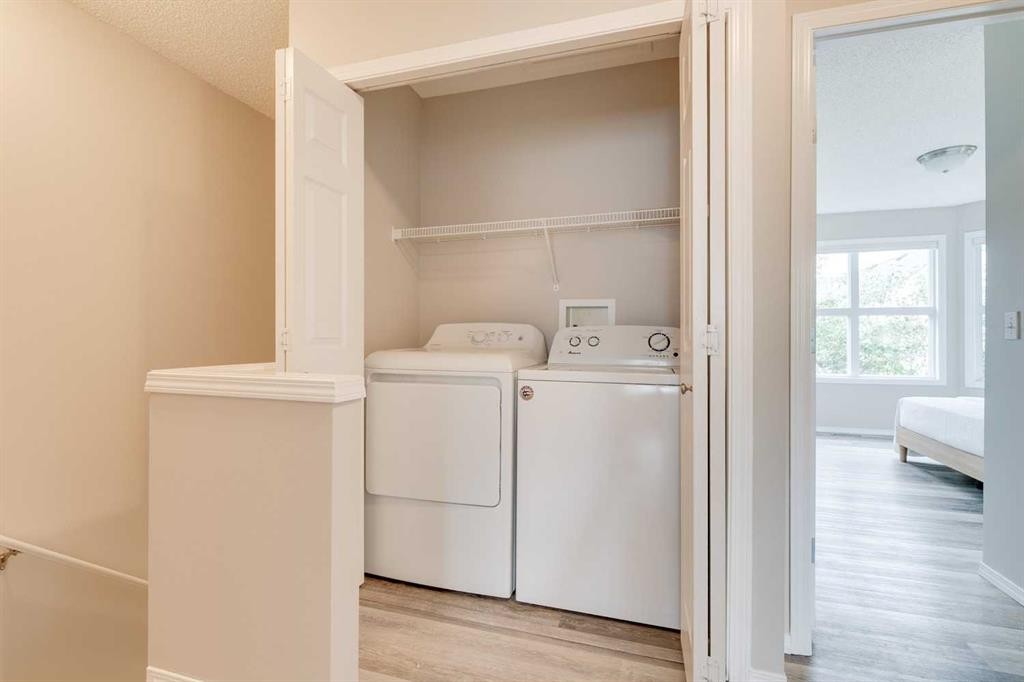 910 Prairie Sound Circle Nw, High River, AB - Indoor Photo Showing Laundry Room
