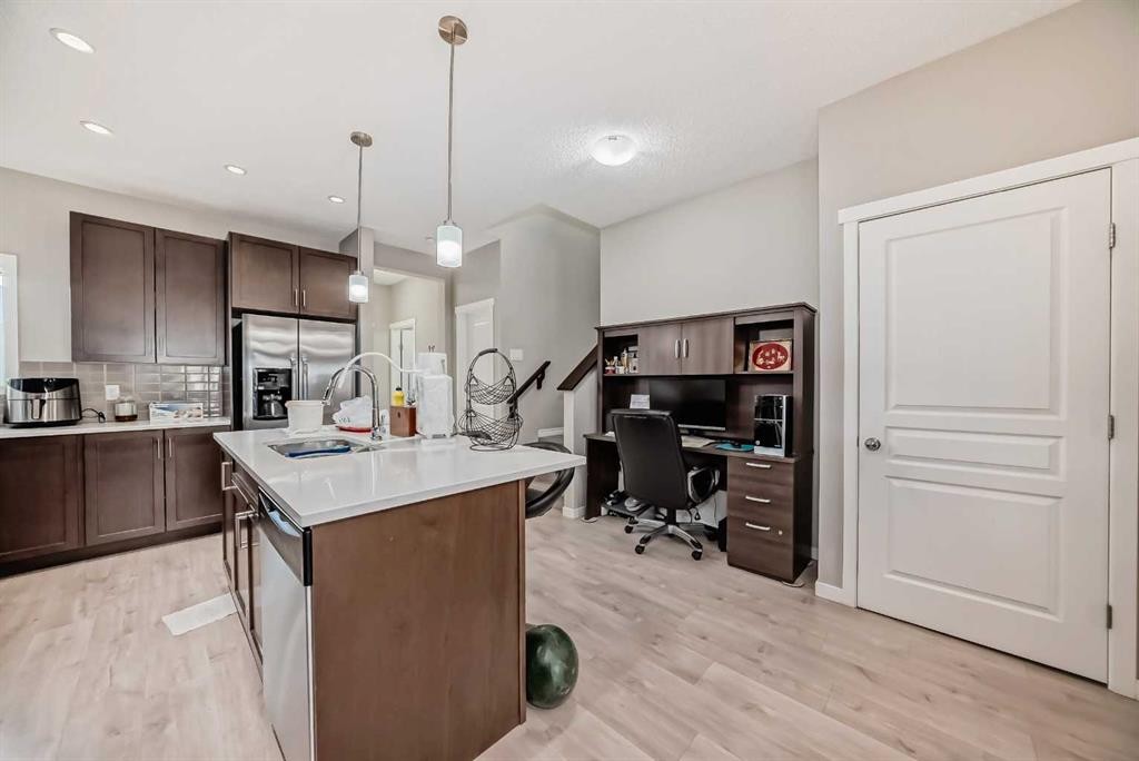 9 Copperpond Avenue Se, Calgary, AB - Indoor Photo Showing Kitchen With Upgraded Kitchen