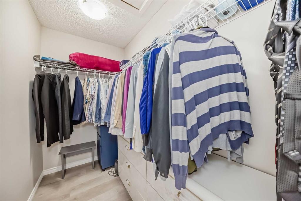 9 Copperpond Avenue Se, Calgary, AB - Indoor With Storage