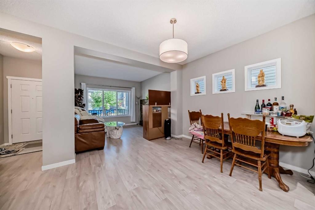 9 Copperpond Avenue Se, Calgary, AB - Indoor Photo Showing Dining Room