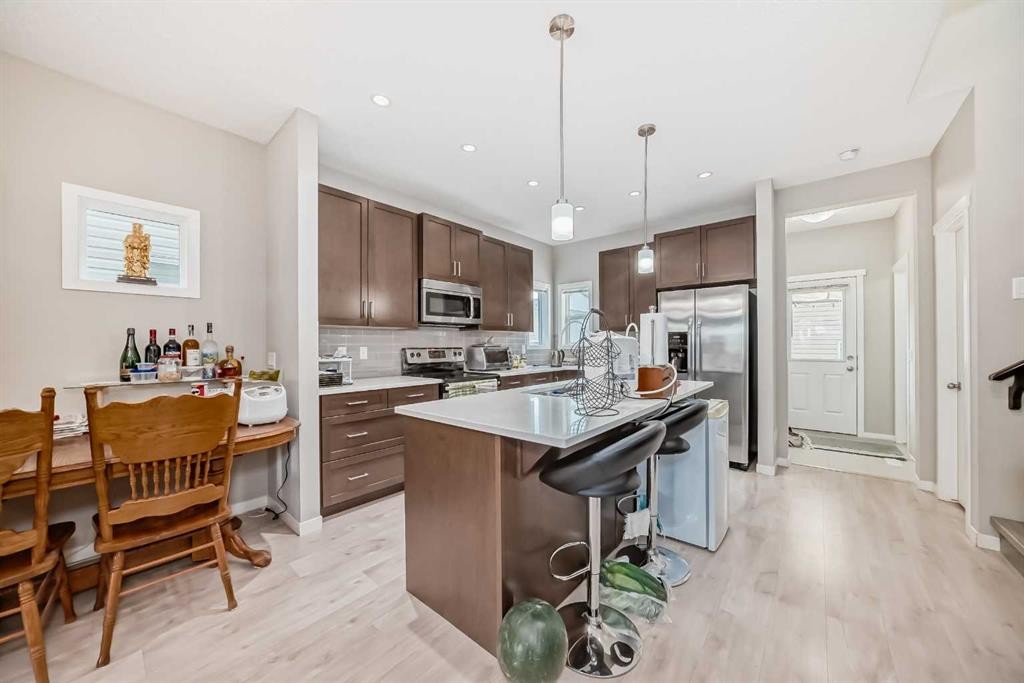 9 Copperpond Avenue Se, Calgary, AB - Indoor Photo Showing Kitchen With Upgraded Kitchen