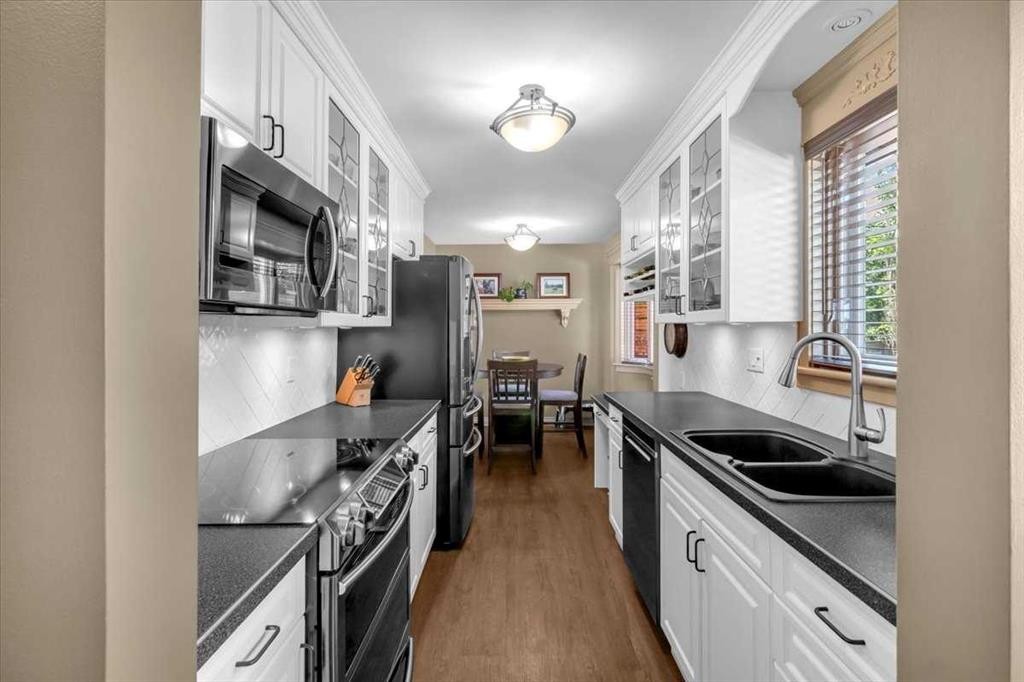 2211 45 Street Se, Calgary, AB - Indoor Photo Showing Kitchen With Double Sink