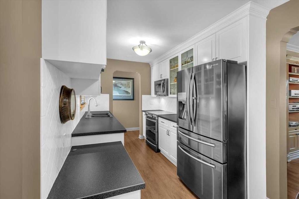 2211 45 Street Se, Calgary, AB - Indoor Photo Showing Kitchen With Double Sink