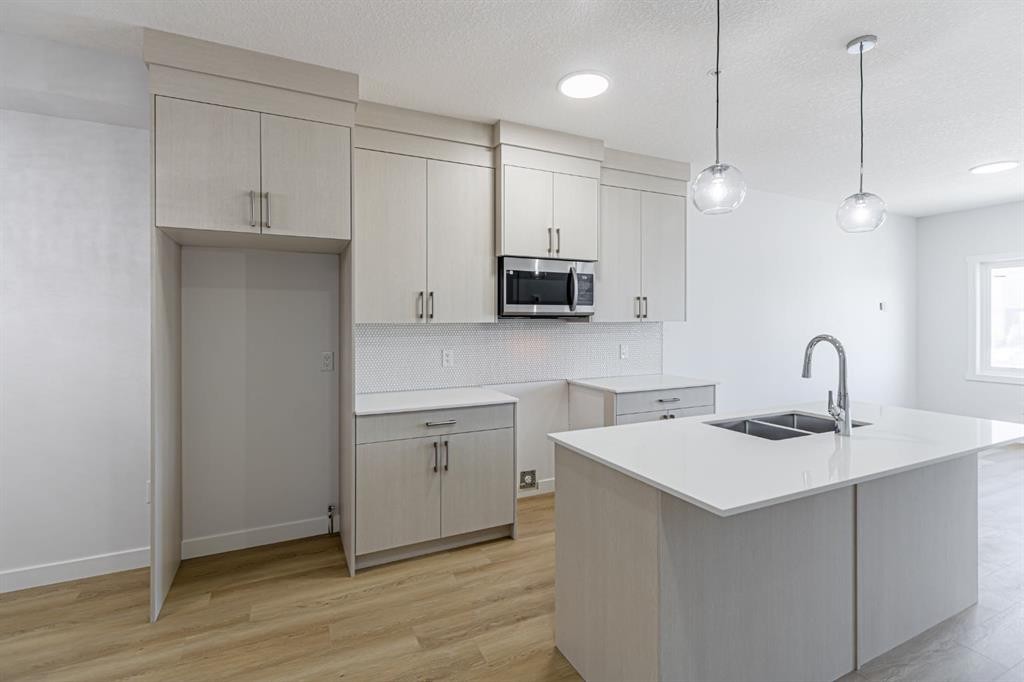 1463 Cornerstone Boulevard Ne, Calgary, AB - Indoor Photo Showing Kitchen With Double Sink