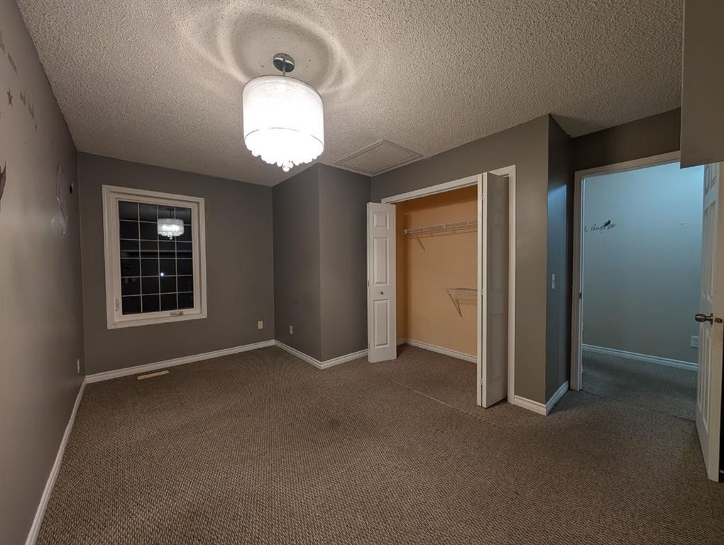 47 Saddleback Way Ne, Calgary, AB - Indoor Photo Showing Other Room