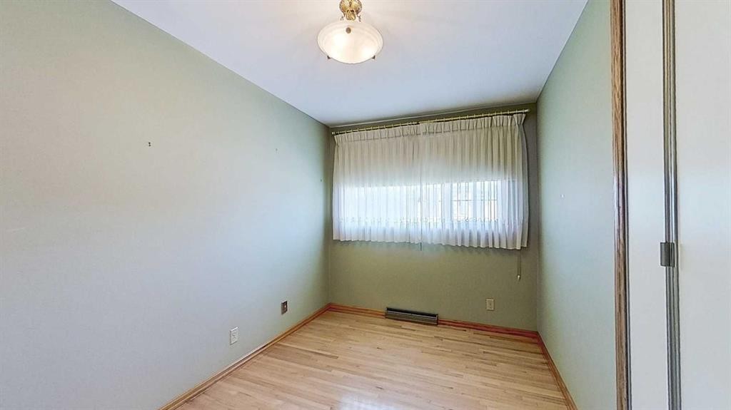 47 Montrose Crescent Ne, Calgary, AB - Indoor Photo Showing Other Room