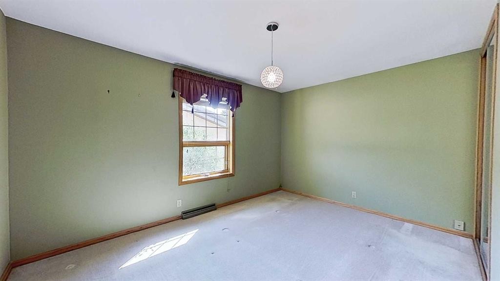 47 Montrose Crescent Ne, Calgary, AB - Indoor Photo Showing Other Room