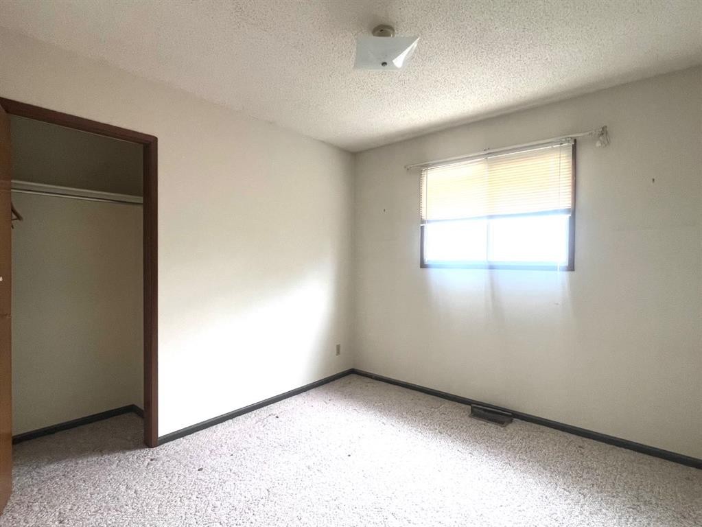 176 Huntchester Crescent Ne, Calgary, AB - Indoor Photo Showing Other Room