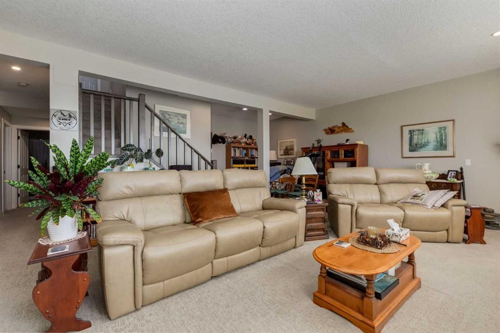 26 Eagleview Way, Cochrane, AB - Indoor Photo Showing Living Room
