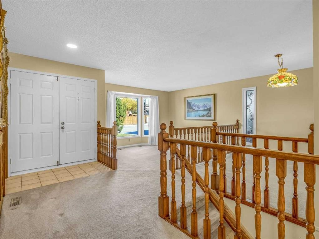 76 Wood Valley Rise Sw, Calgary, AB - Indoor Photo Showing Other Room