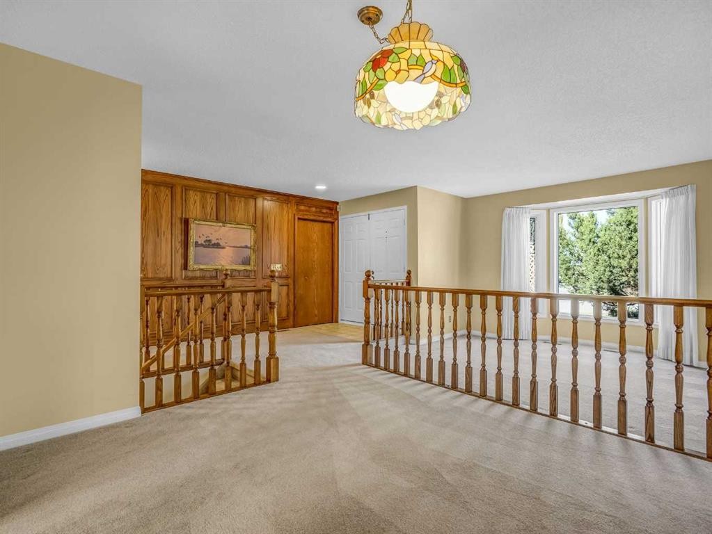 76 Wood Valley Rise Sw, Calgary, AB - Indoor Photo Showing Other Room
