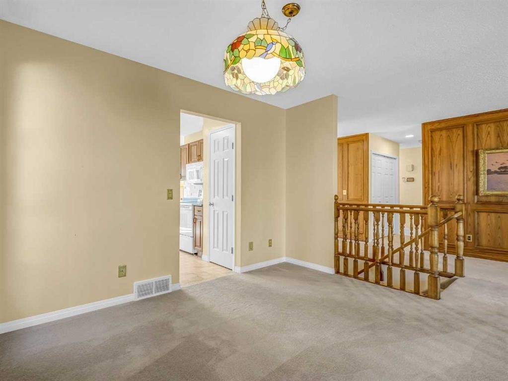 76 Wood Valley Rise Sw, Calgary, AB - Indoor Photo Showing Other Room