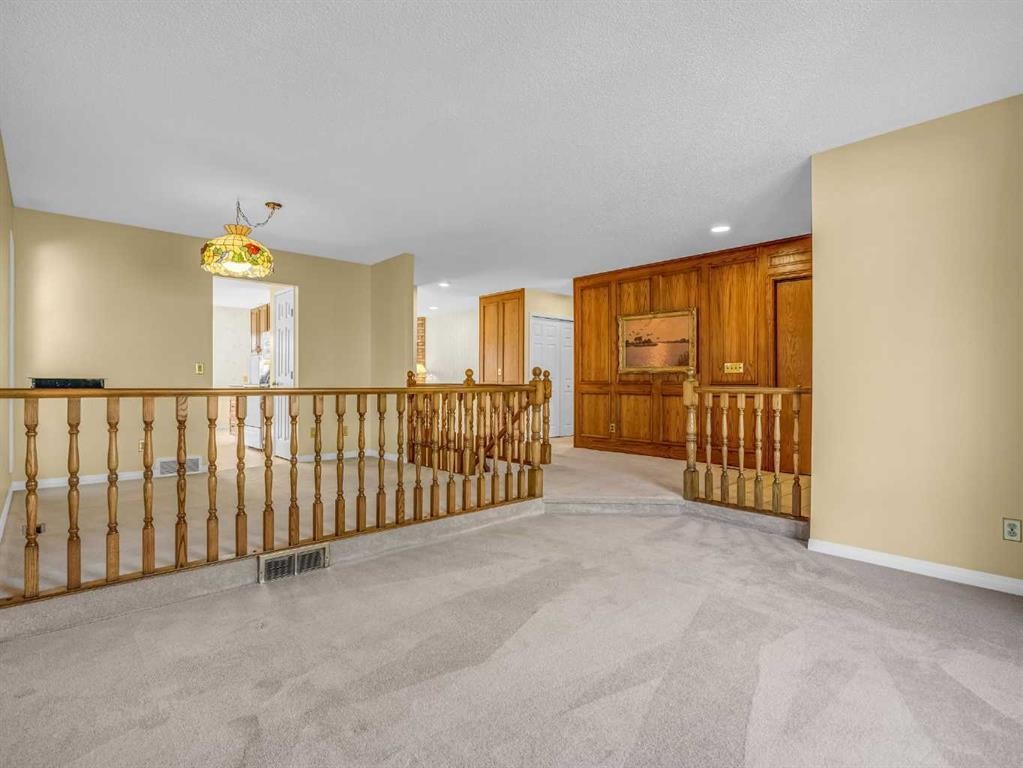 76 Wood Valley Rise Sw, Calgary, AB - Indoor Photo Showing Other Room