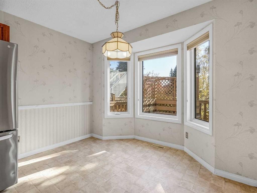 76 Wood Valley Rise Sw, Calgary, AB - Indoor Photo Showing Other Room