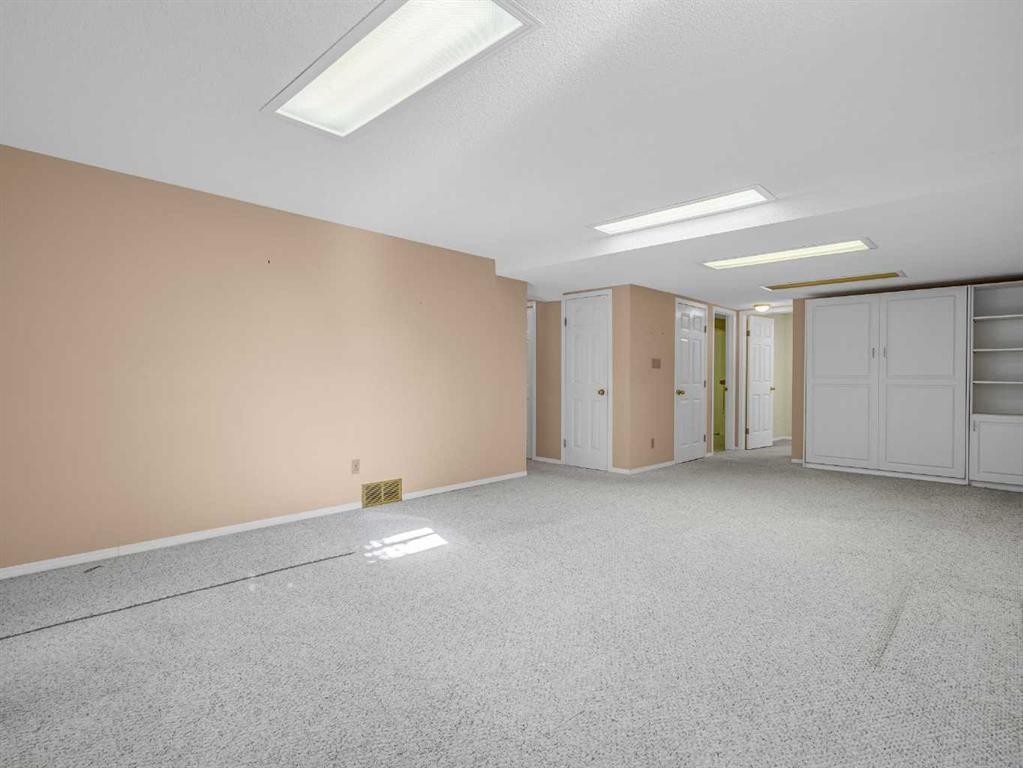 76 Wood Valley Rise Sw, Calgary, AB - Indoor Photo Showing Other Room