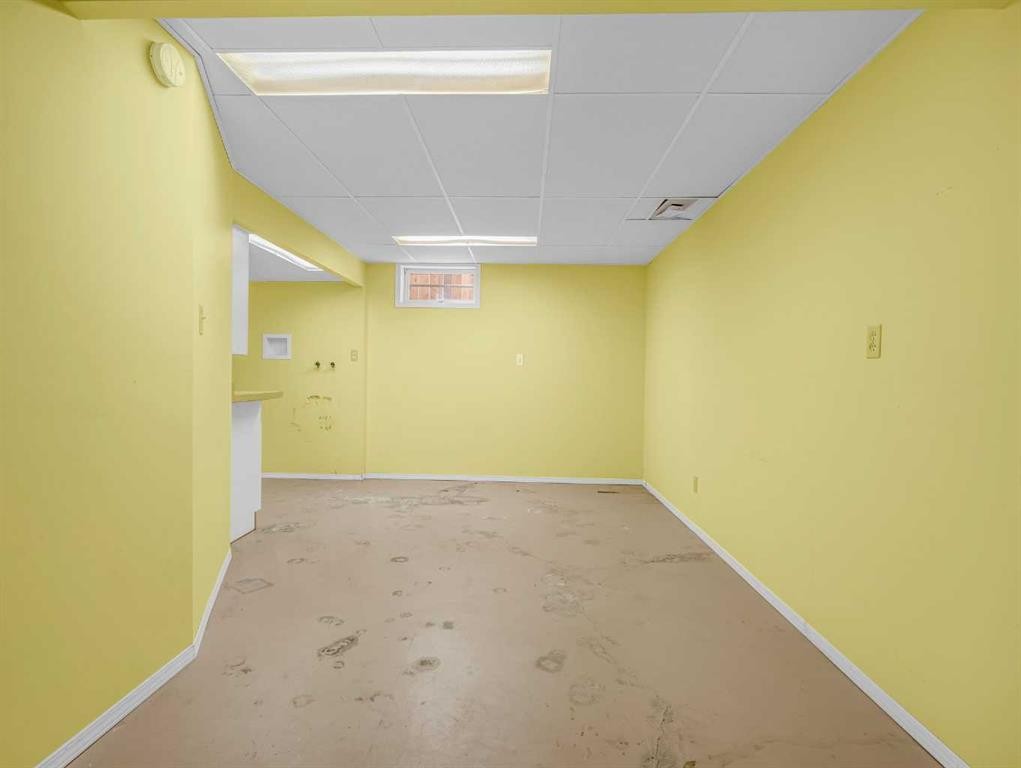 76 Wood Valley Rise Sw, Calgary, AB - Indoor Photo Showing Basement