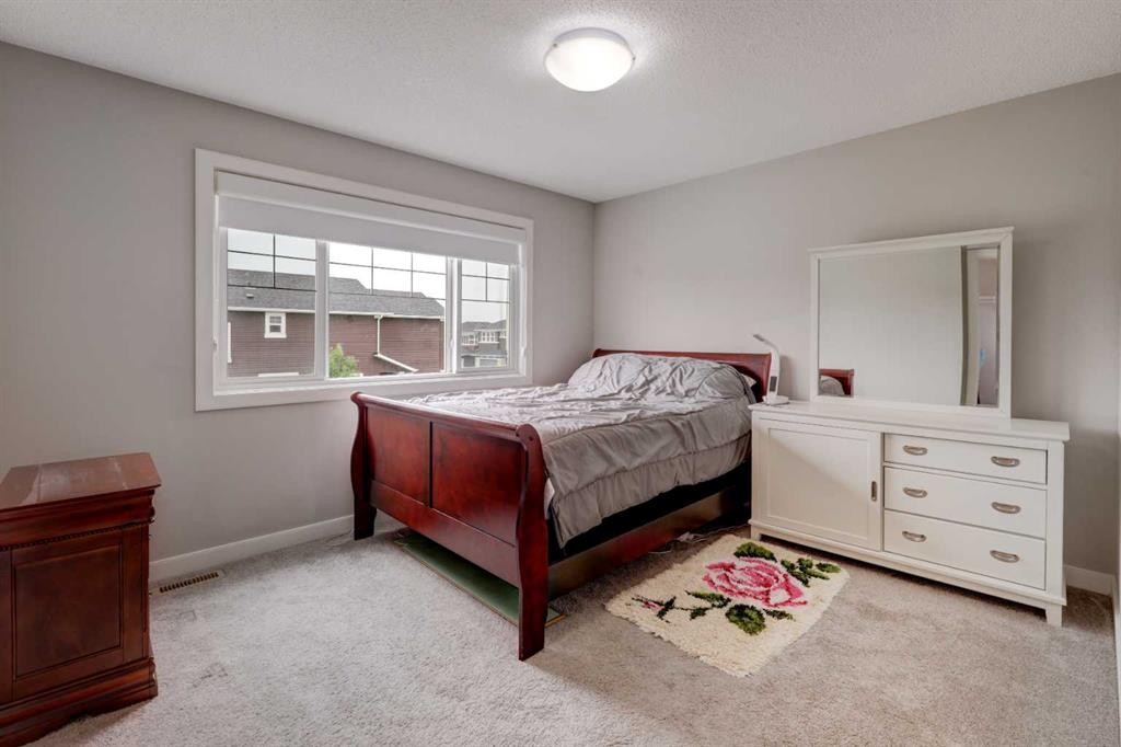 52 Red Embers Manor Ne, Calgary, AB - Indoor Photo Showing Bedroom