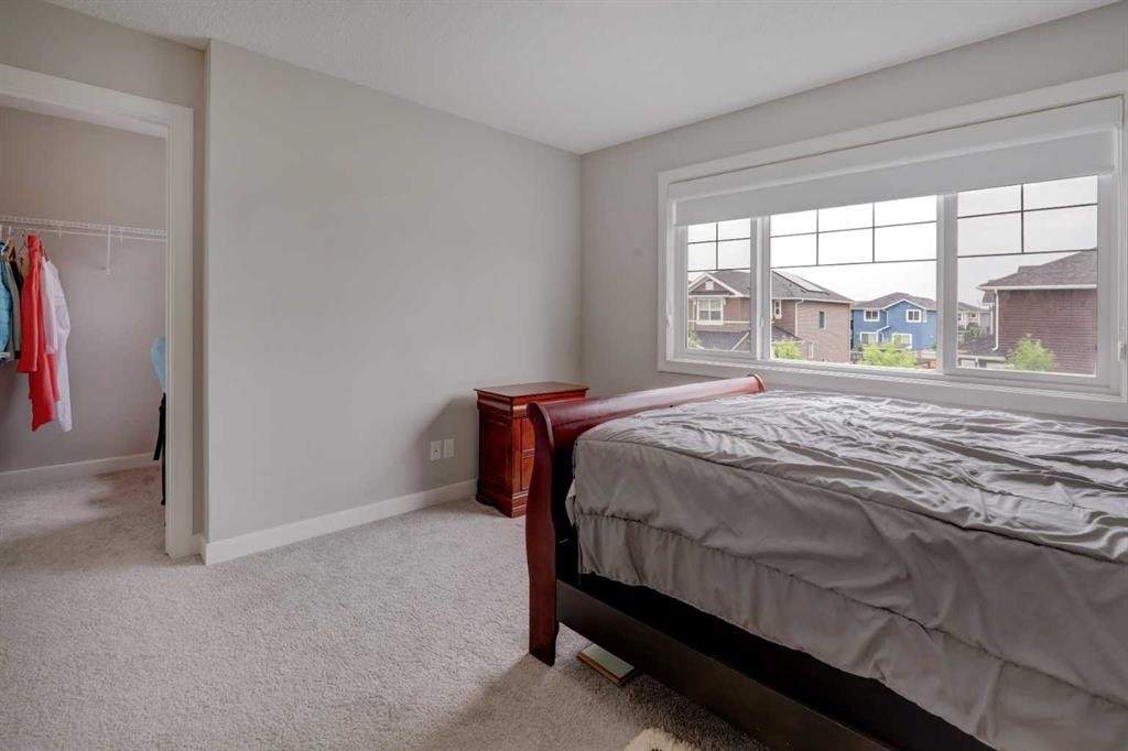 52 Red Embers Manor Ne, Calgary, AB - Indoor Photo Showing Bedroom