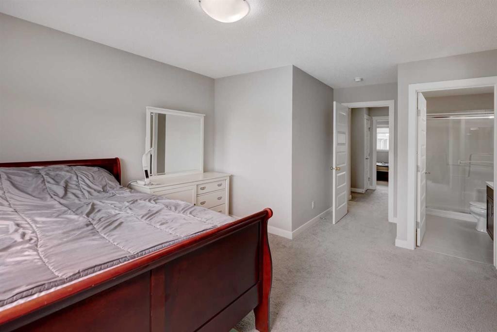 52 Red Embers Manor Ne, Calgary, AB - Indoor Photo Showing Bedroom
