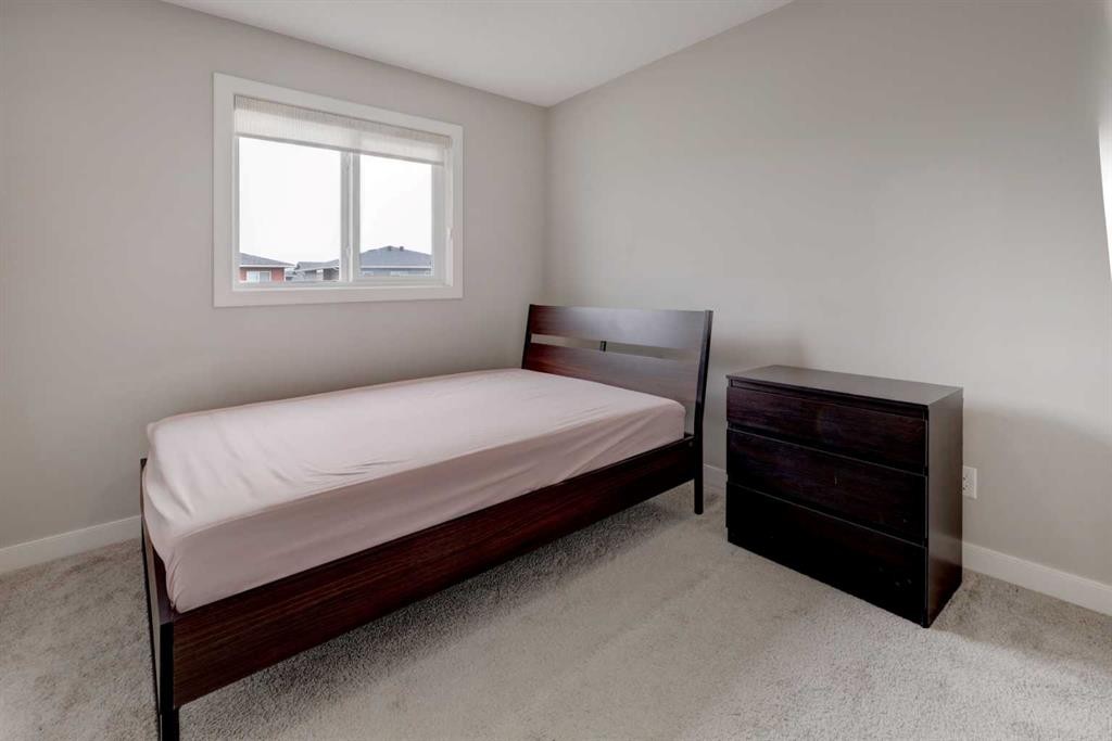 52 Red Embers Manor Ne, Calgary, AB - Indoor Photo Showing Bedroom