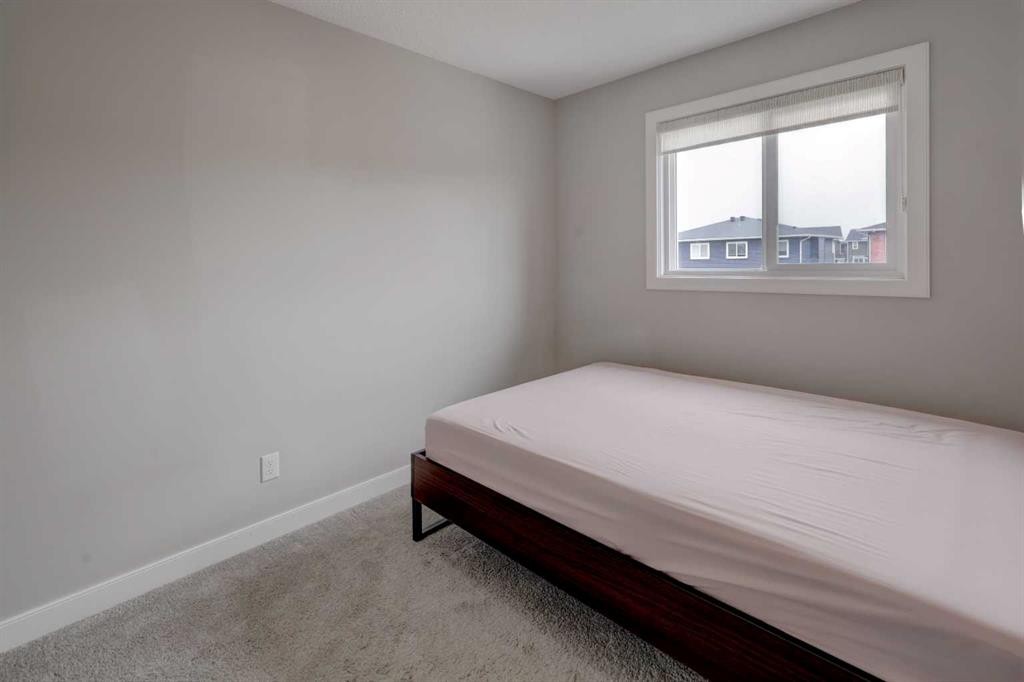 52 Red Embers Manor Ne, Calgary, AB - Indoor Photo Showing Bedroom