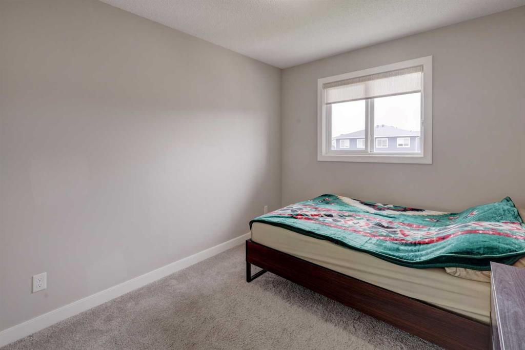 52 Red Embers Manor Ne, Calgary, AB - Indoor Photo Showing Bedroom